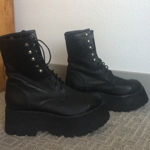 Black leather platform combat boots